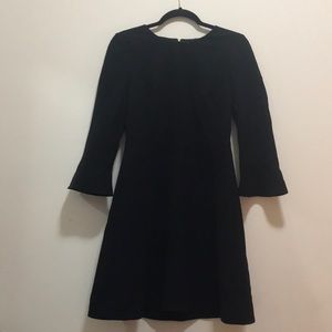 Black, bell-sleeved dress